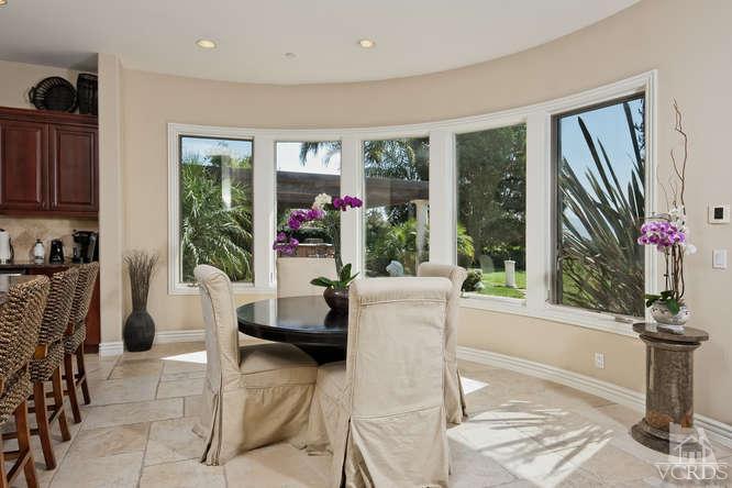 430 Sereno Place Camarillo, CA 93010 - Photo 11 of 33 a living room with furniture and a floor to ceiling window