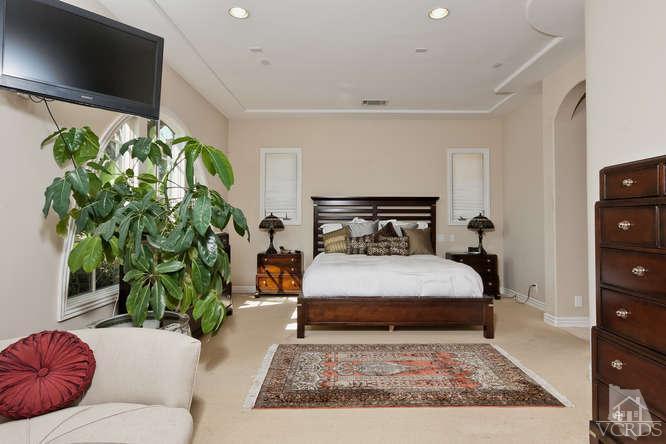 430 Sereno Place Camarillo, CA 93010 - Photo 14 of 33 a bedroom with a bed window and mirror