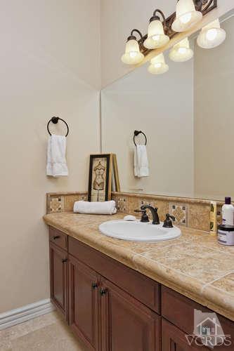 430 Sereno Place Camarillo, CA 93010 - Photo 22 of 33 a bathroom with a sink and vanity