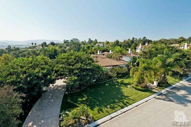 430 Sereno Place Camarillo, CA 93010 - Photo 3 of 33 a view of a garden with a building in the background