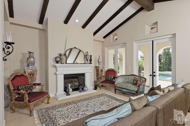 430 Sereno Place Camarillo, CA 93010 - Photo 9 of 33 a living room with furniture and a fireplace