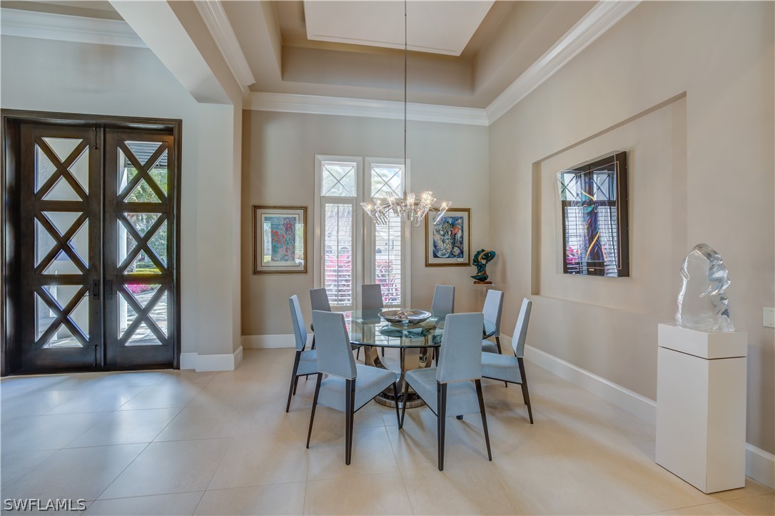 4257 Deephaven Lane Naples, FL 34119 - Photo 2 of 13 a dining room with furniture and window