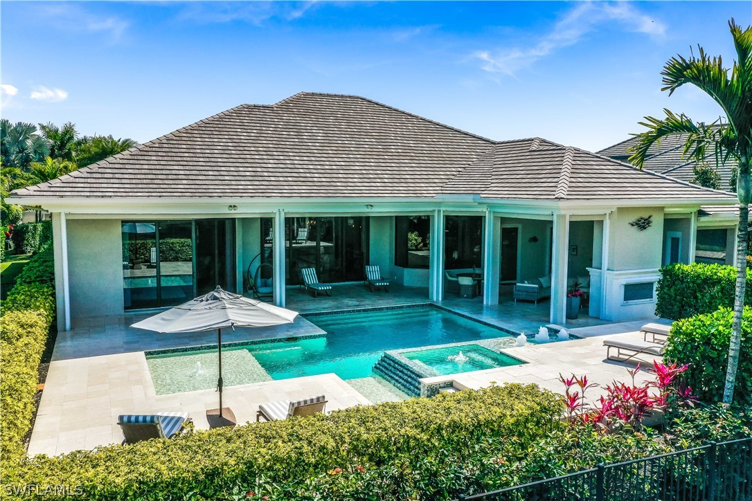 4257 Deephaven Lane Naples, FL 34119 - Photo 4 of 13 front view of a house with a yard