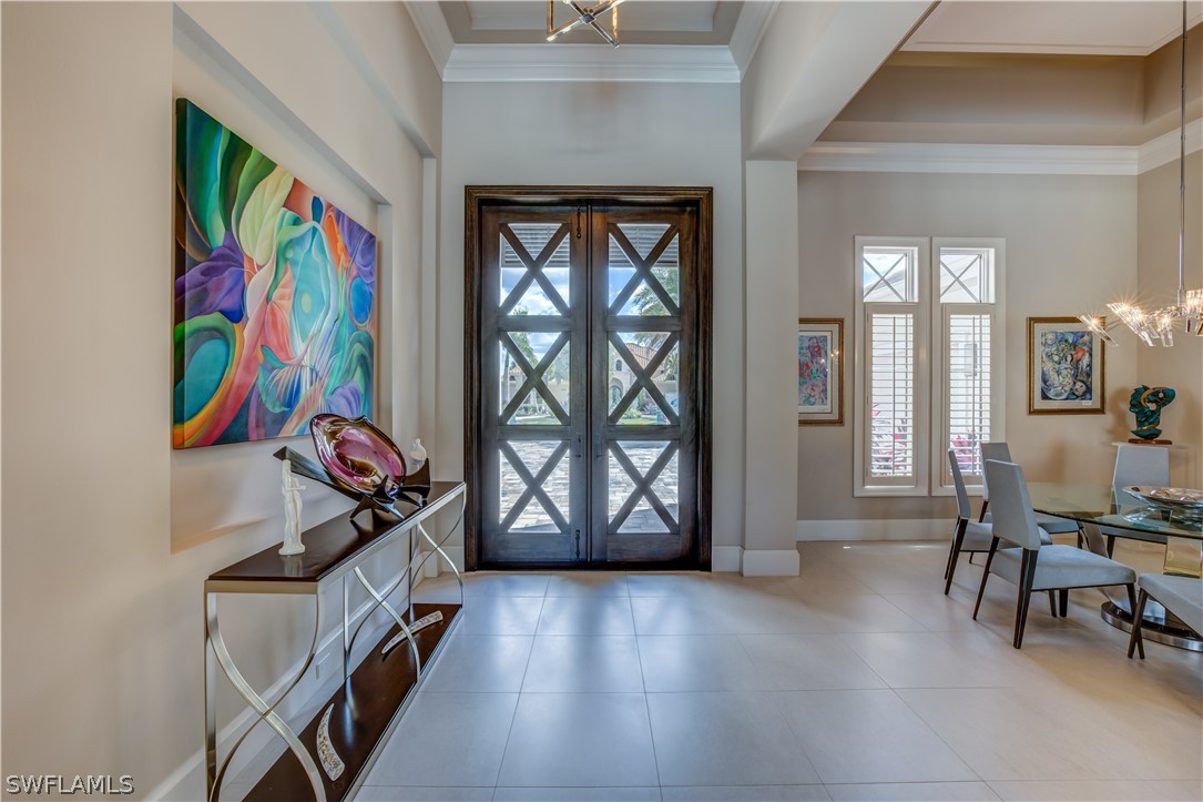 4257 Deephaven Lane Naples, FL 34119 - Photo 5 of 13 a view of an entryway with a workspace