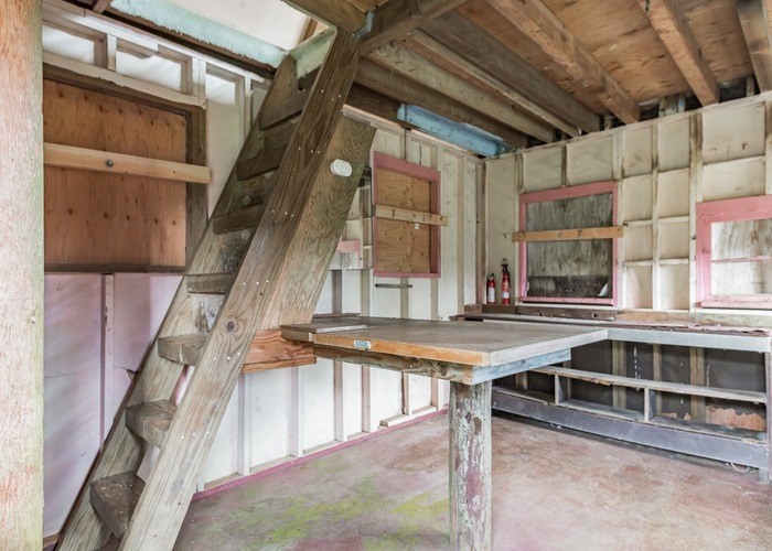 59 Kaiwiki Road Hilo, HI 96720 - Photo 20 of 22 a view of a kitchen with a sink and cabinets