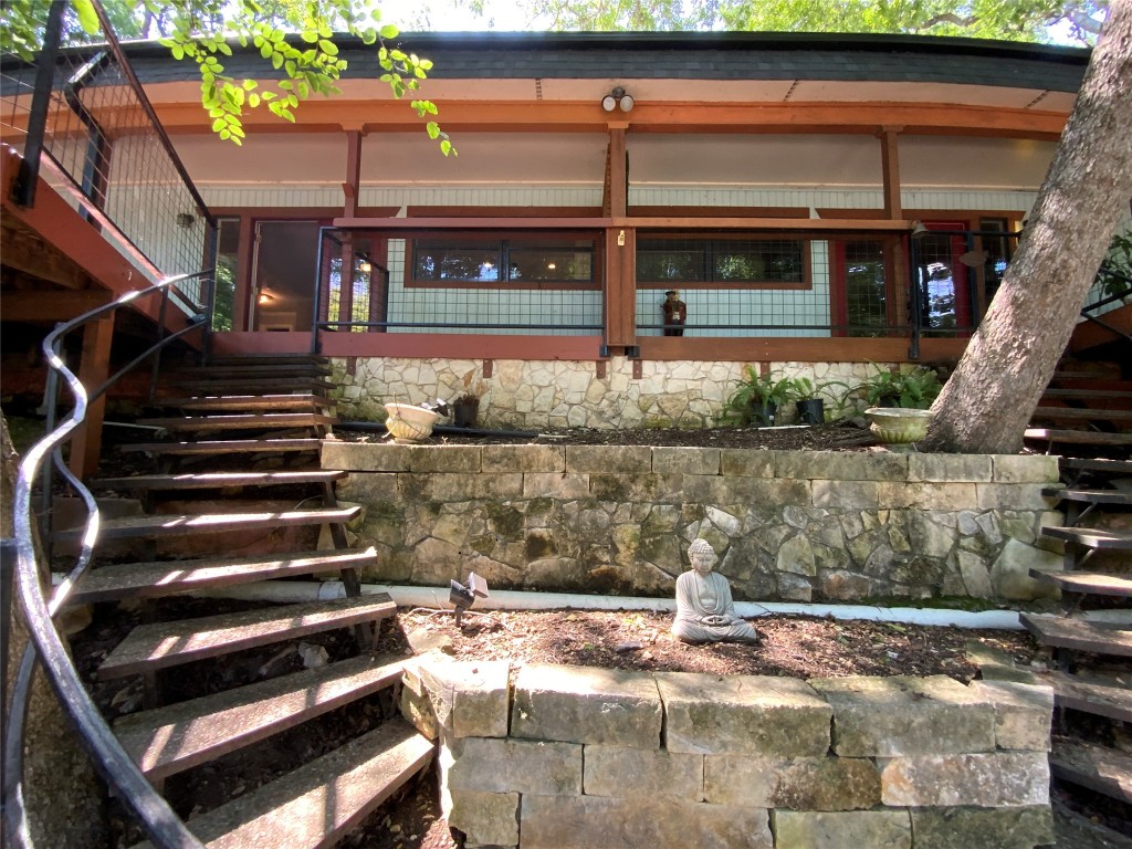 2807 Edgewater Drive, Unit A Austin, TX 78733 - Photo 1 of 1 a view of building with an outdoor space