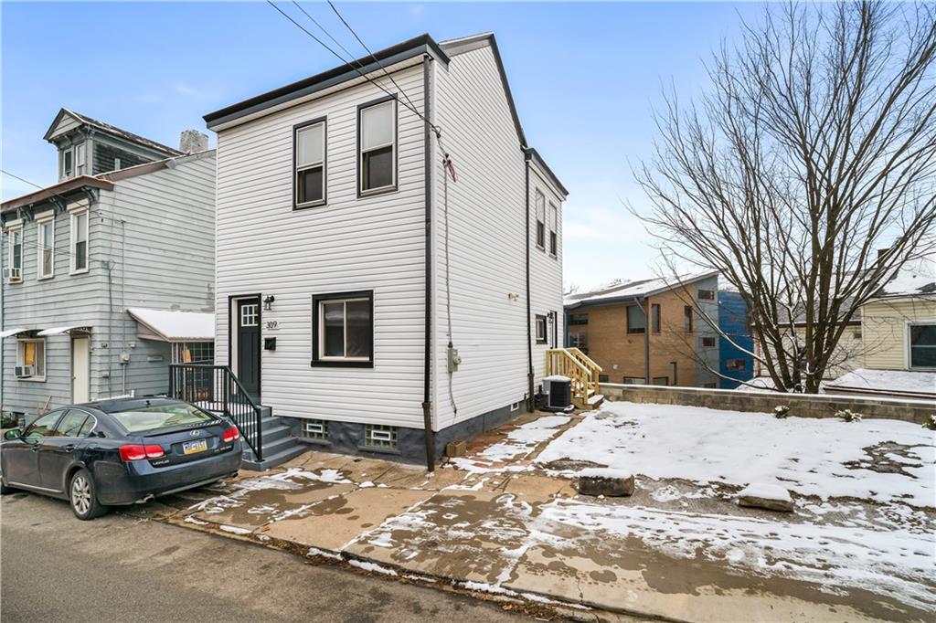 309 North Mathilda Street Pittsburgh, PA 15224 - Photo 3 of 30 a view of house with a yard
