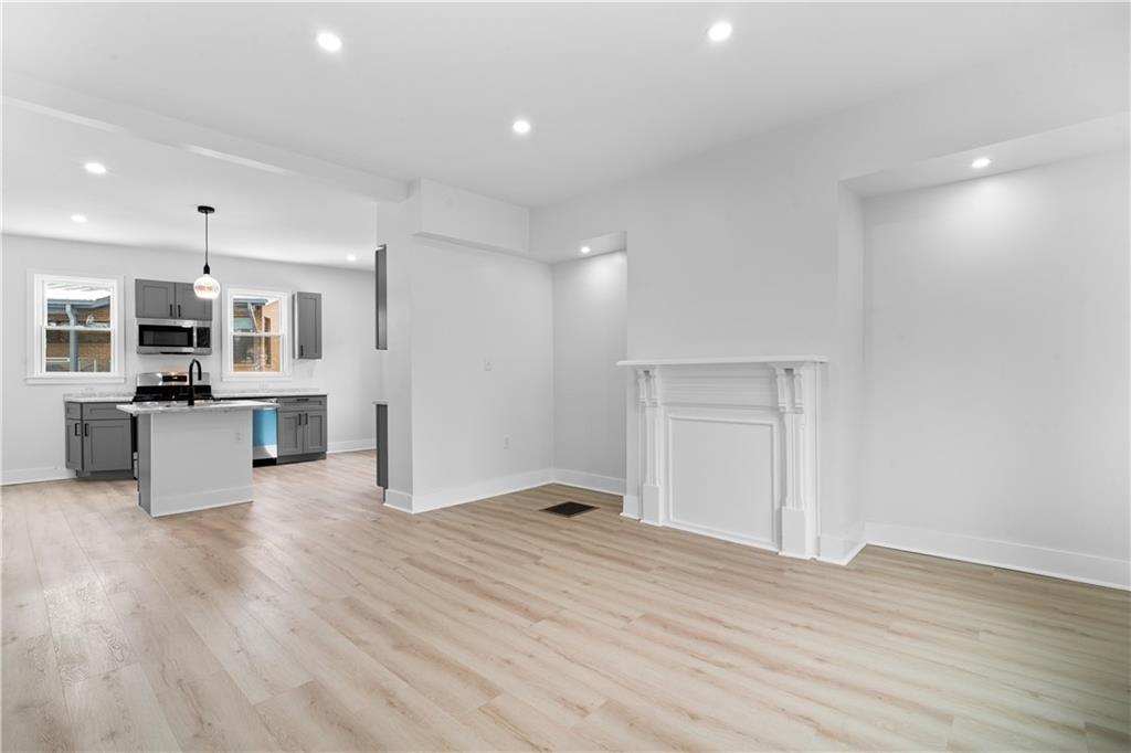 309 North Mathilda Street Pittsburgh, PA 15224 - Photo 4 of 30 a view of kitchen with wooden floor