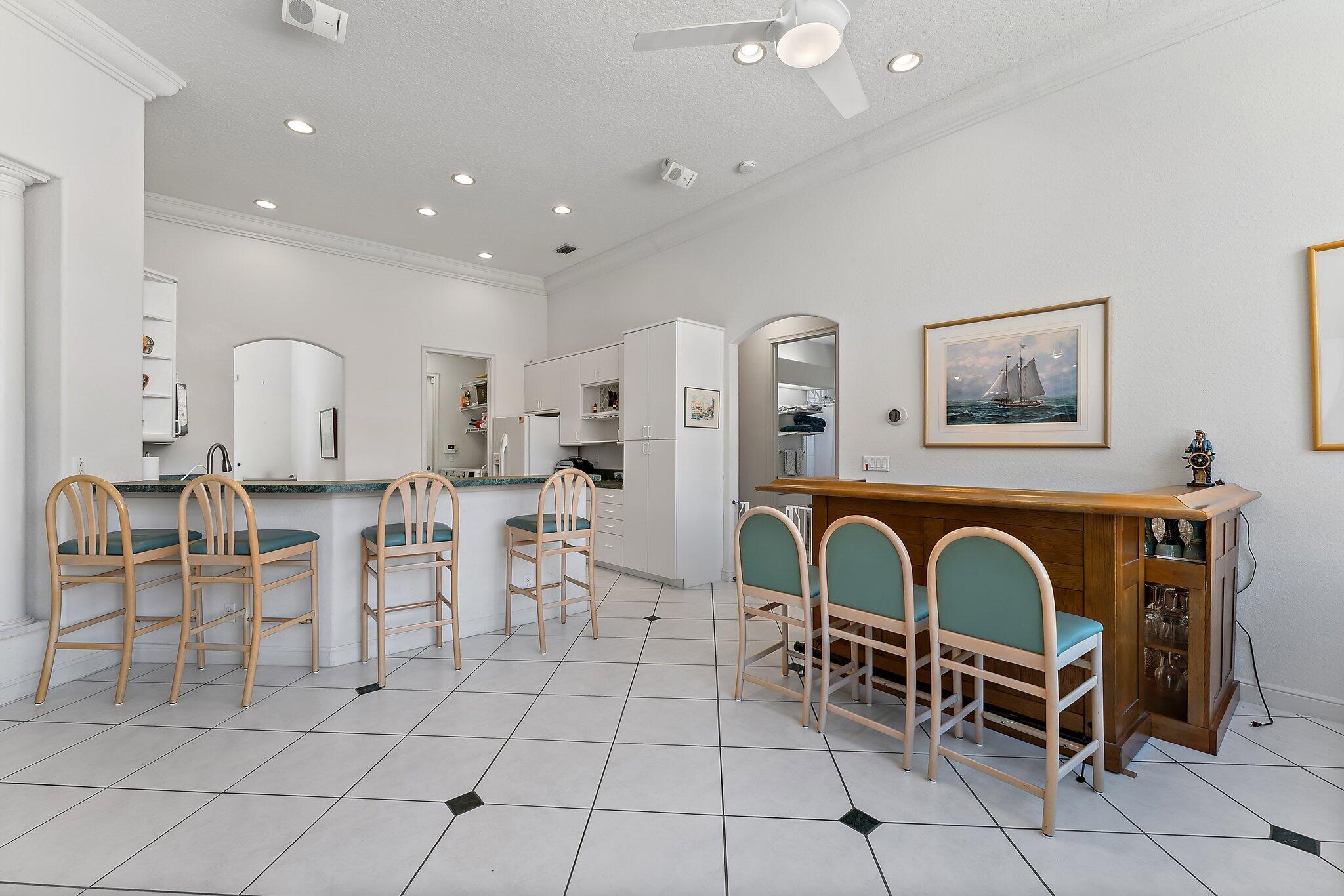 103 Timber Lane Jupiter, FL 33458 - Photo 17 of 40 Family Room & Bar