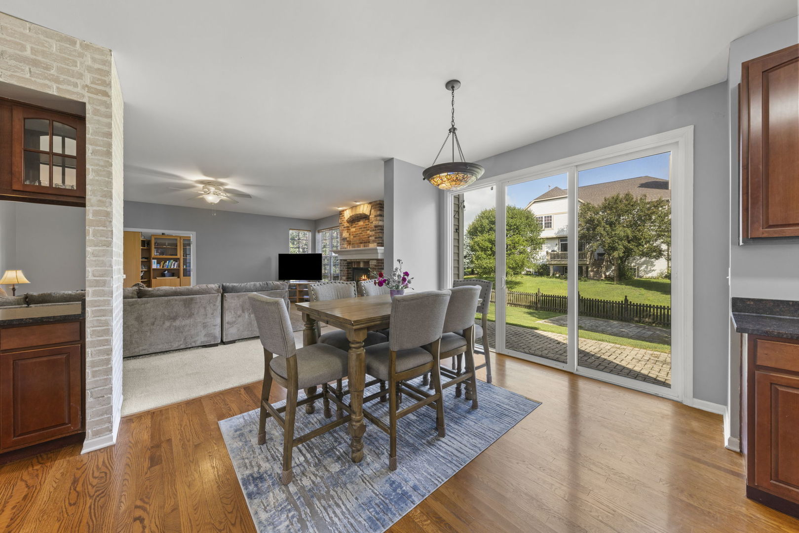 26210 Mapleview Drive Plainfield, IL 60585 - Photo 12 of 55 a view of a dining room with furniture window and wooden floor