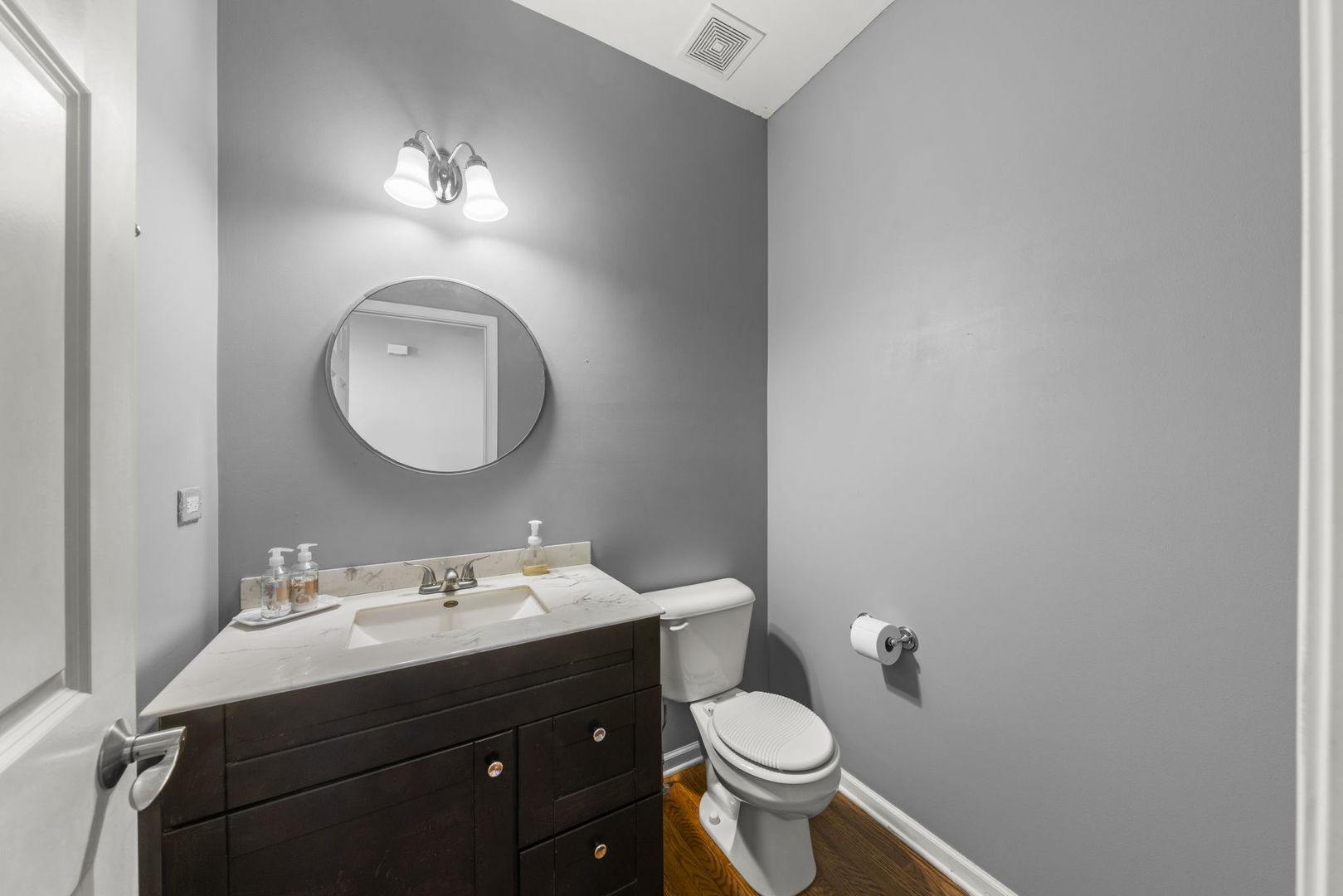 26210 Mapleview Drive Plainfield, IL 60585 - Photo 17 of 55 a bathroom with a sink vanity mirror and toilet