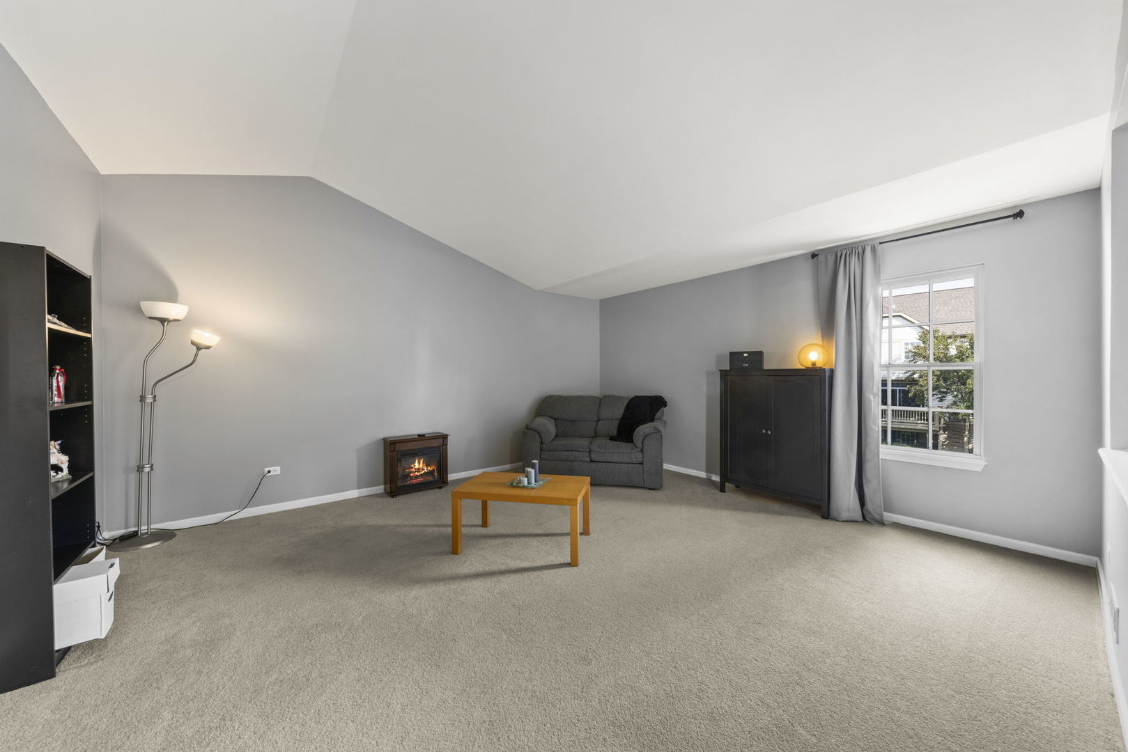 26210 Mapleview Drive Plainfield, IL 60585 - Photo 20 of 55 a view of an empty room with furniture and windows