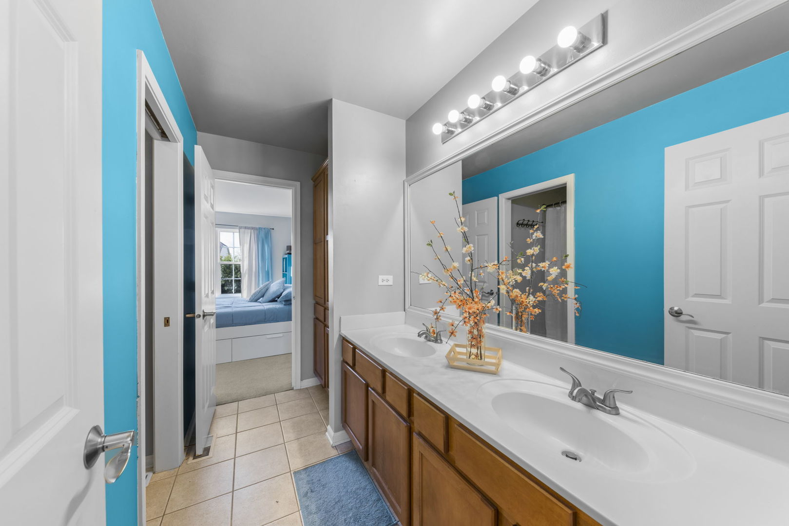 26210 Mapleview Drive Plainfield, IL 60585 - Photo 25 of 55 a spacious bathroom with a double vanity sink and a mirror
