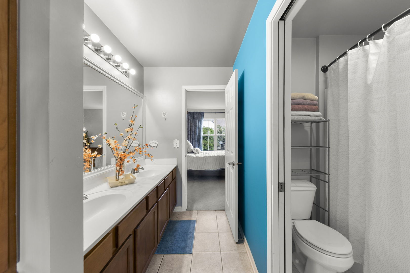 26210 Mapleview Drive Plainfield, IL 60585 - Photo 26 of 55 a en suite bathroom with a sink a toilet and a large mirror