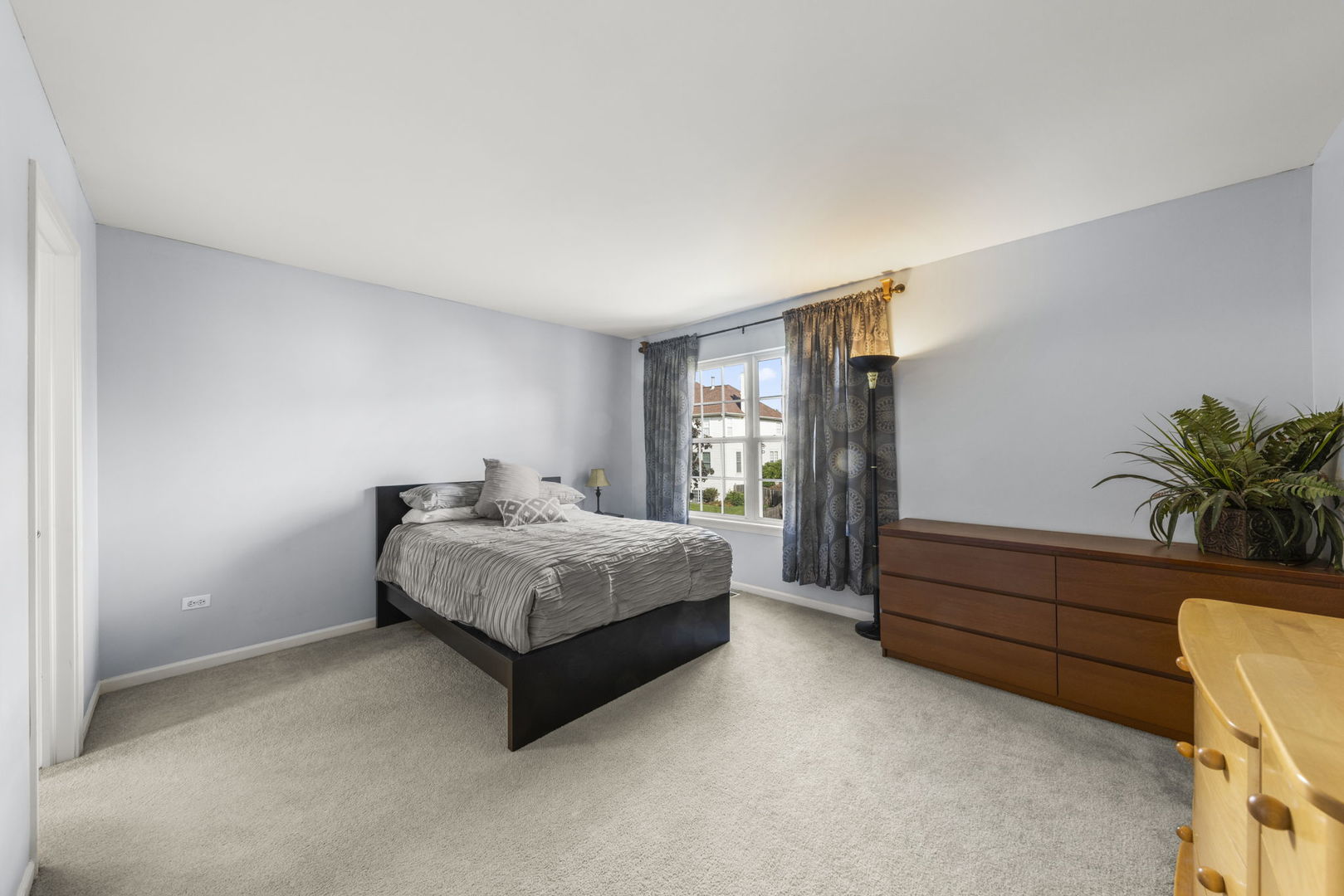 26210 Mapleview Drive Plainfield, IL 60585 - Photo 27 of 55 a spacious bedroom with a bed and a window