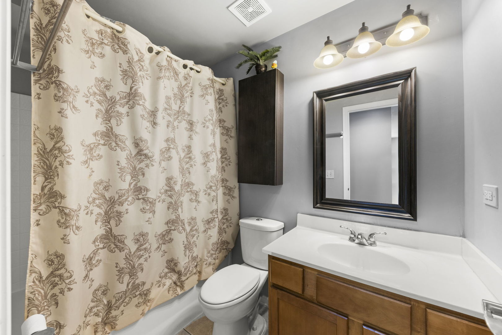 26210 Mapleview Drive Plainfield, IL 60585 - Photo 30 of 55 a bathroom with a sink and a mirror