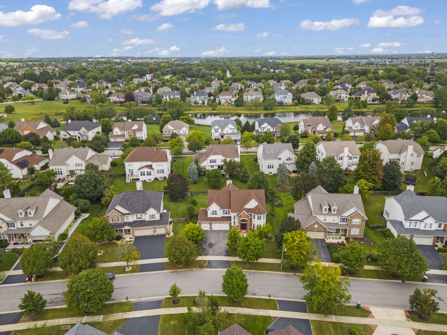 26210 Mapleview Drive Plainfield, IL 60585 - Photo 45 of 55 an aerial view of residential houses with outdoor space