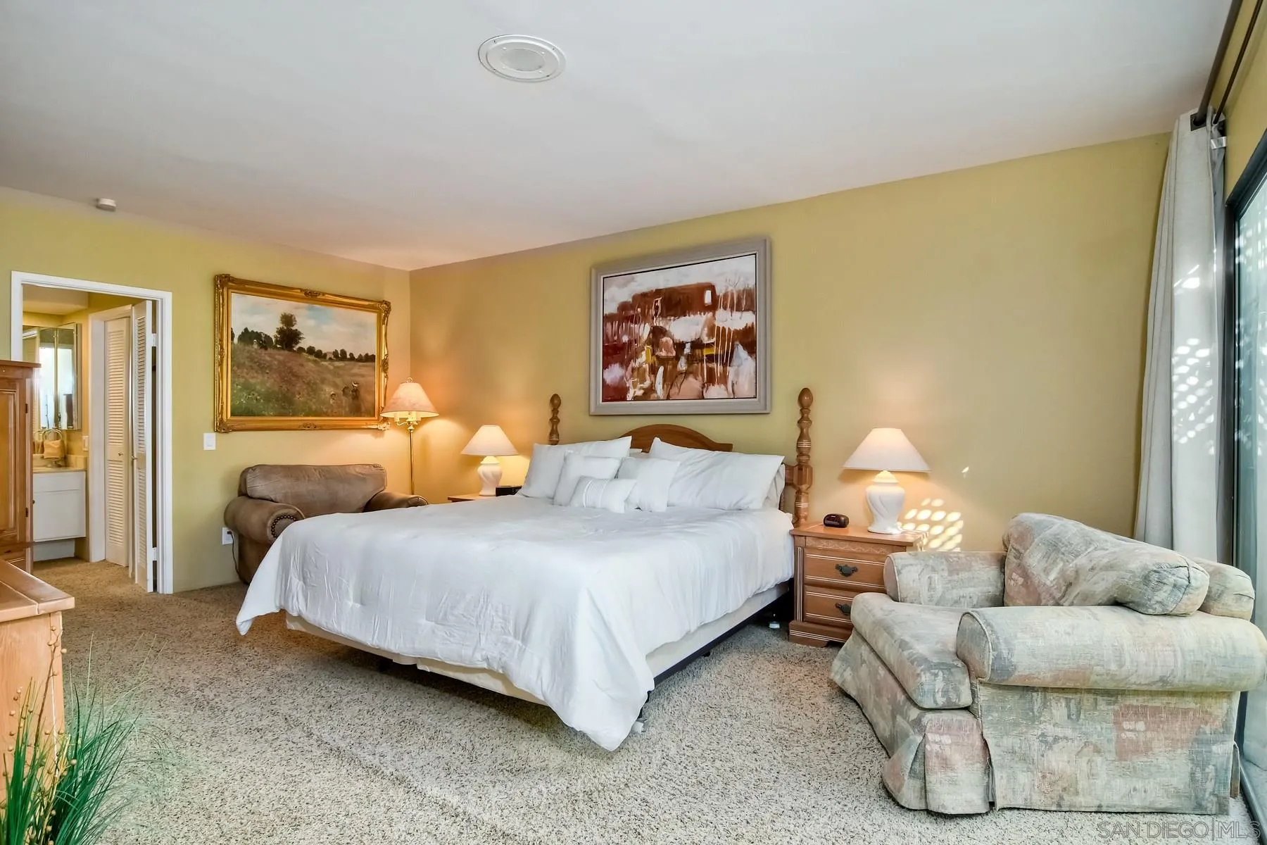 13416 The Square Poway, CA 92064 - Photo 23 of 35 a bedroom with a bed and a couch