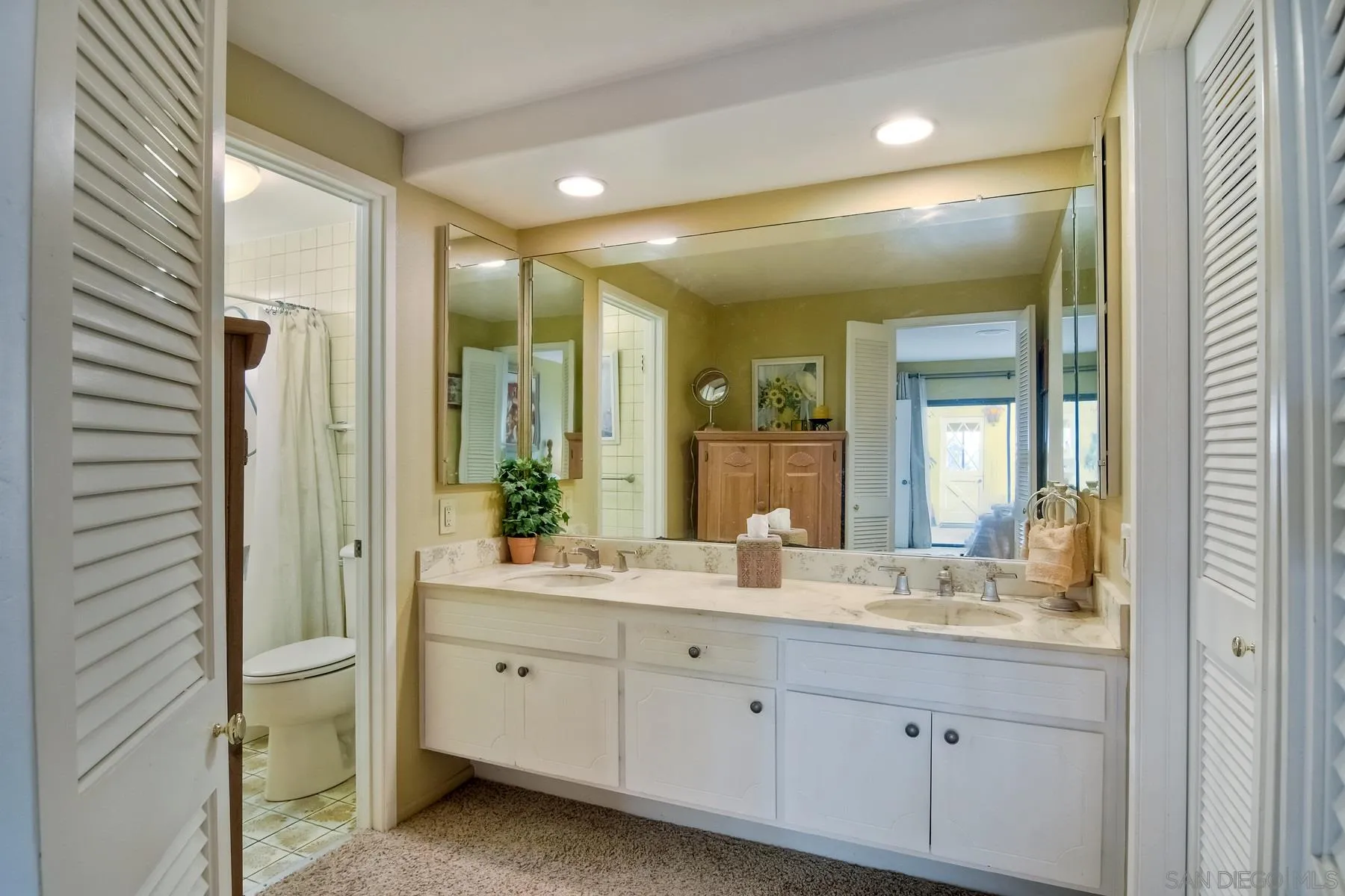 13416 The Square Poway, CA 92064 - Photo 25 of 35 a bathroom with a double vanity sink mirror and double