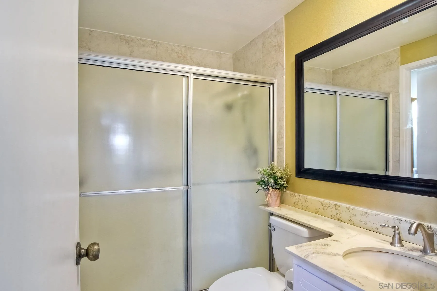 13416 The Square Poway, CA 92064 - Photo 31 of 35 a bathroom with a granite countertop shower sink vanity and toilet