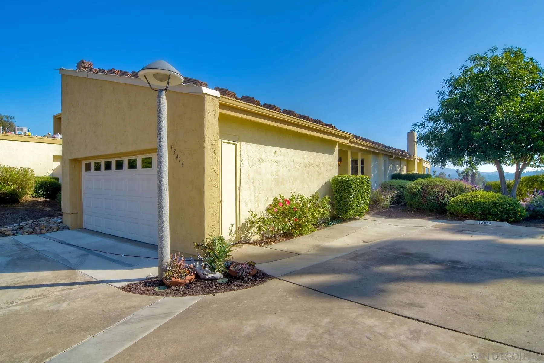 13416 The Square Poway, CA 92064 - Photo 32 of 35 a view of a house with a street