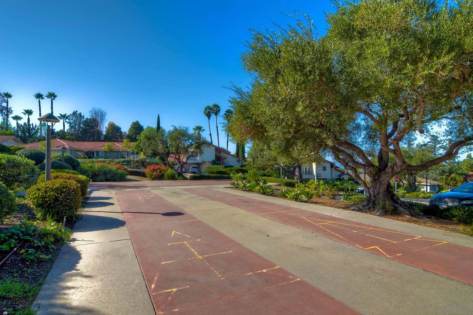 13416 The Square Poway, CA 92064 - Photo 35 of 35 a view of a street with houses on both side