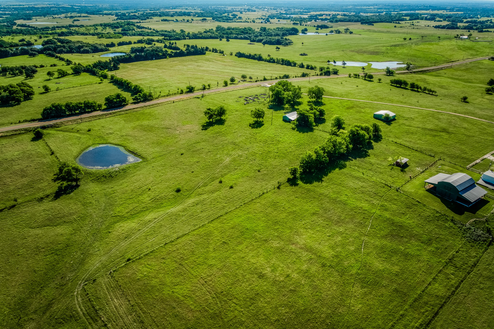 5005 Fuchs Road Burton, TX 77835 - Photo 11 of 12 a view of a golf course with a park