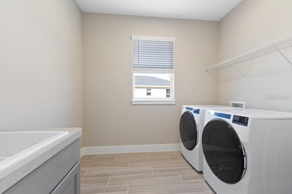 4529 Northwest 53rd Avenue Road Ocala, FL 34482 - Photo 16 of 17 a room with a washer and dryer