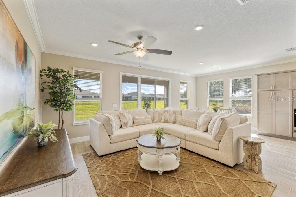 4529 Northwest 53rd Avenue Road Ocala, FL 34482 - Photo 9 of 17 a living room with furniture and a large window
