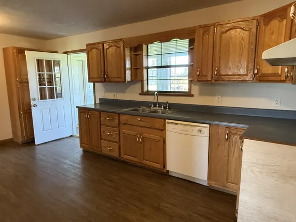 a bathroom with a toilet and a sink