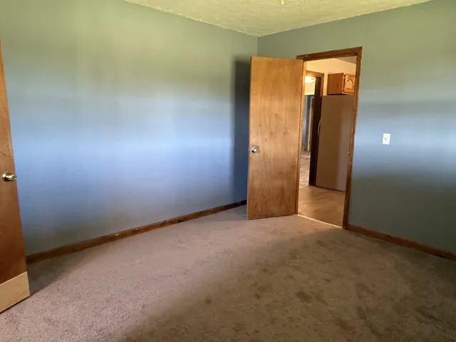 a view of a room with an empty space