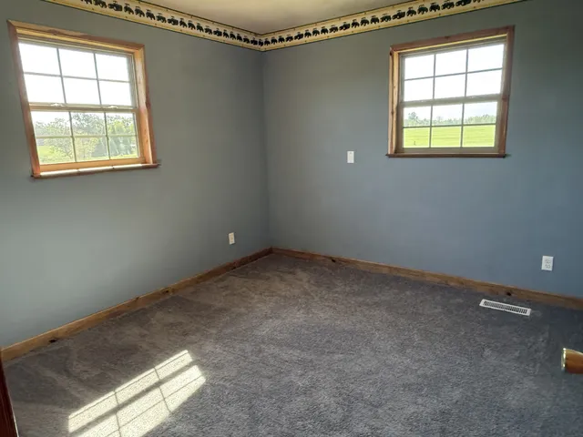a view of a room that has a window