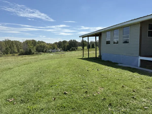 a view of an outdoor space and a yard