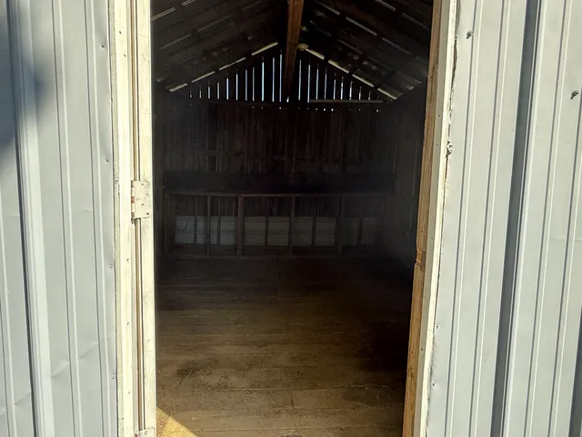 a view of outdoor space with deck and yard