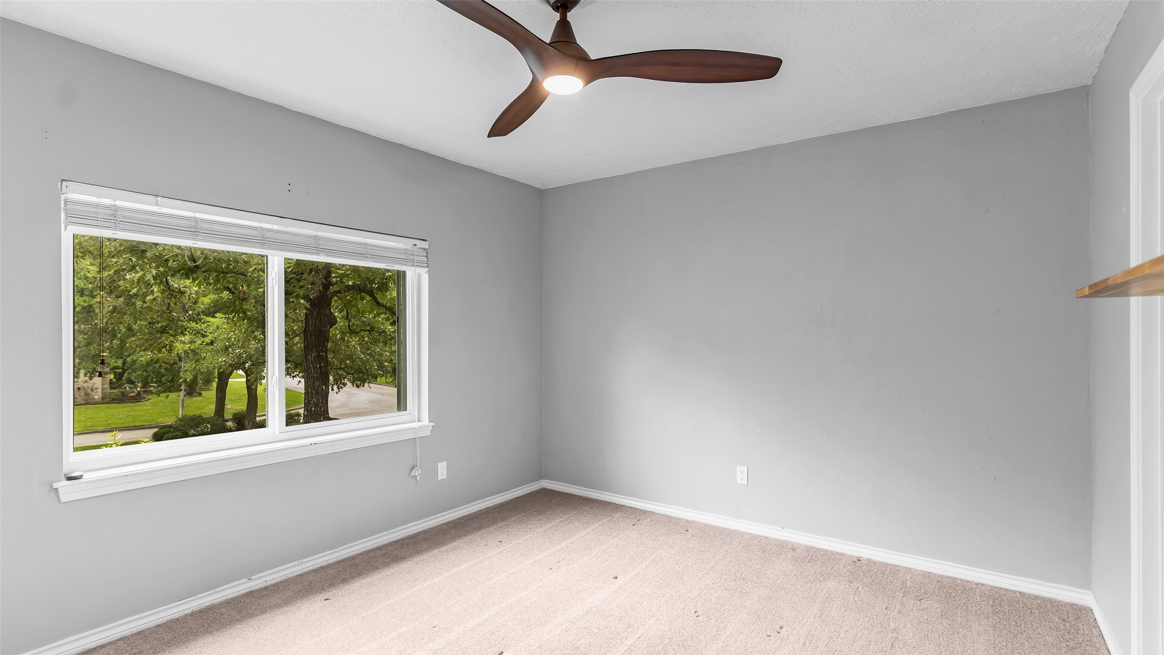 2607 Laurel Ridge Drive Houston, TX 77345 - Photo 31 of 47 an empty room with a window