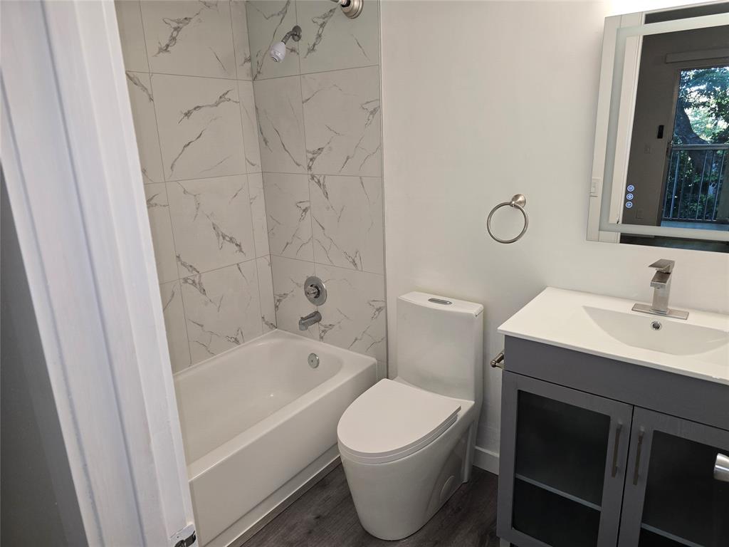251 Southwest 132nd Way, Unit 308H Pembroke Pines, FL 33027 - Photo 11 of 33 a bathroom with a sink toilet and shower