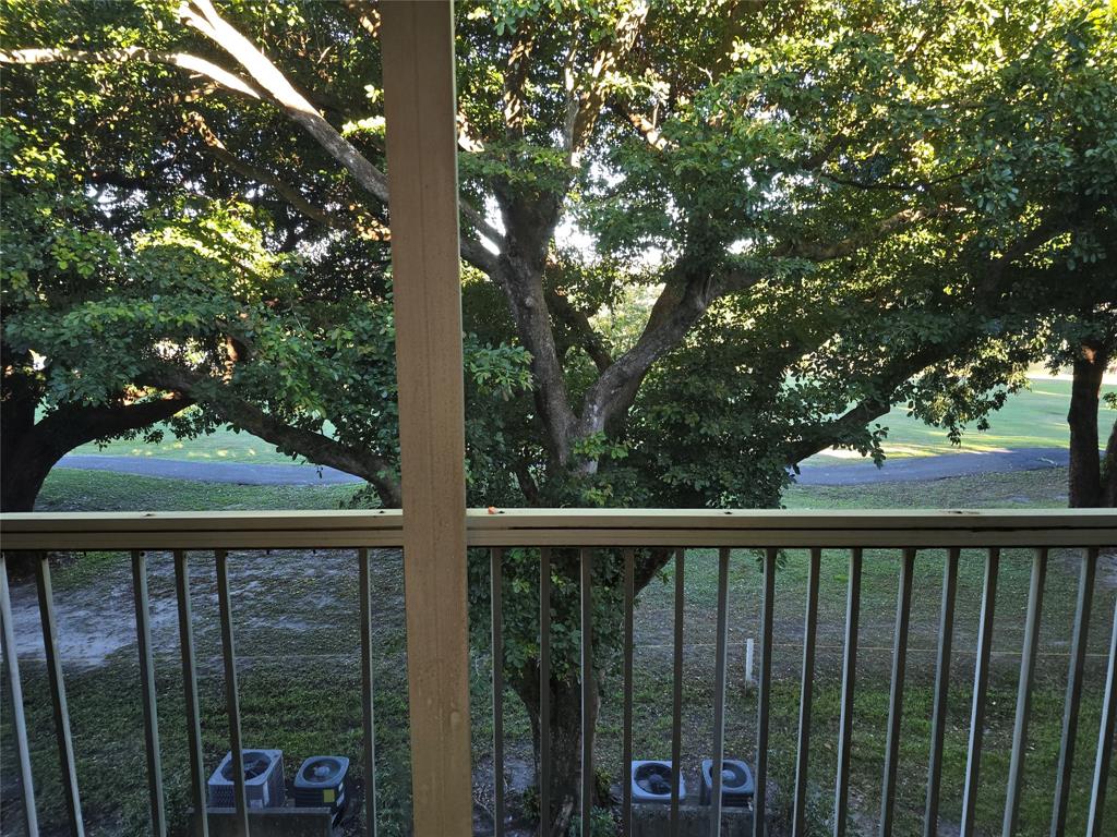 251 Southwest 132nd Way, Unit 308H Pembroke Pines, FL 33027 - Photo 12 of 33 a view of a street from a balcony