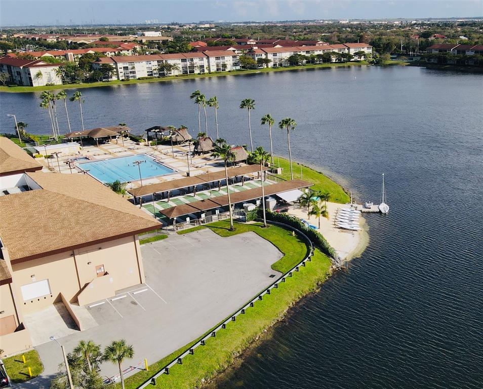 251 Southwest 132nd Way, Unit 308H Pembroke Pines, FL 33027 - Photo 25 of 33 an aerial view of a house with a lake view