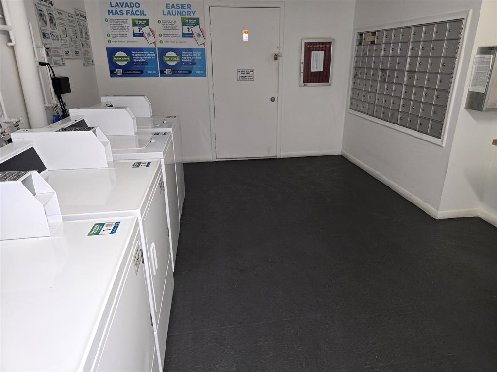 251 Southwest 132nd Way, Unit 308H Pembroke Pines, FL 33027 - Photo 8 of 33 a utility room with dryer and washer