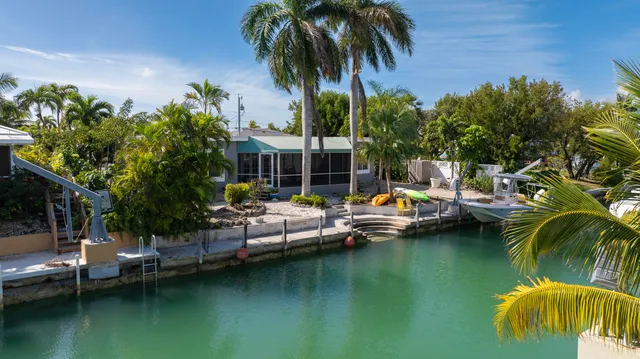 a view of swimming pool with chairs