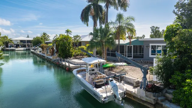 a view of yard with swimming pool and outdoor seating