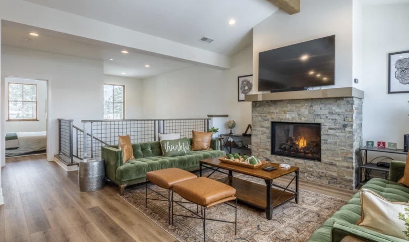 1463 Boulder Creek Road, Unit 1463 Mammoth Lakes, CA 93546 - Photo 7 of 37 a living room with furniture and a fireplace