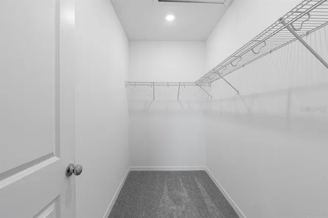 a view of a room with racks on the wall