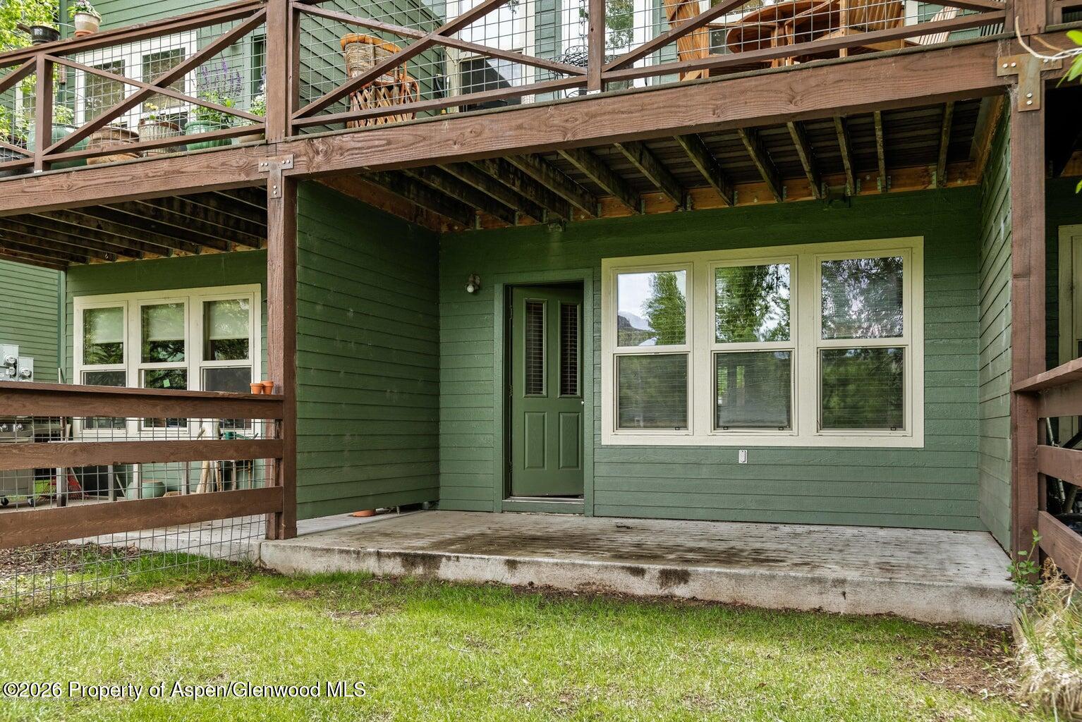 604 Lakeside Drive Basalt, CO 81621 - Photo 20 of 28 a front view of a house with a yard