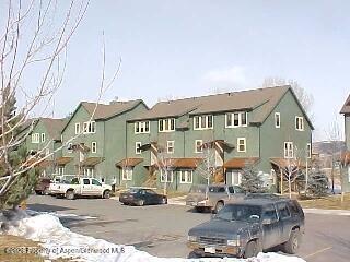 604 Lakeside Drive Basalt, CO 81621 - Photo 24 of 28 a front view of a building with street view