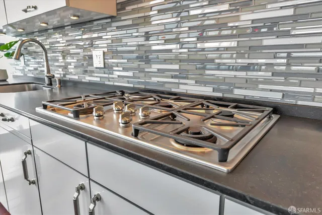 a view of a livingroom with furniture and a window