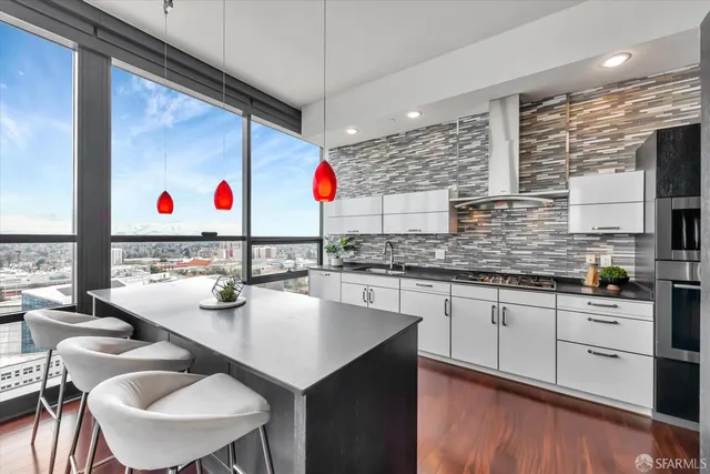 a bedroom with a bed a mirror and a window