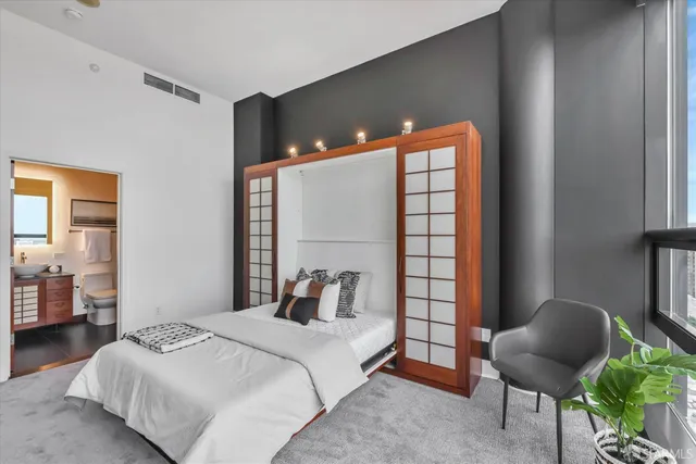 a bathroom with a toilet sink and shower