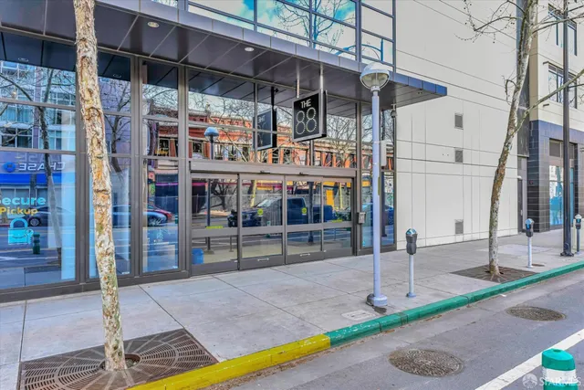 a view of a patio with a table and chairs
