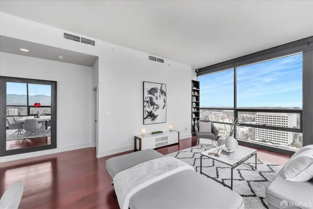 a bedroom with furniture and window